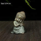 Statue Bouddha à Genoux